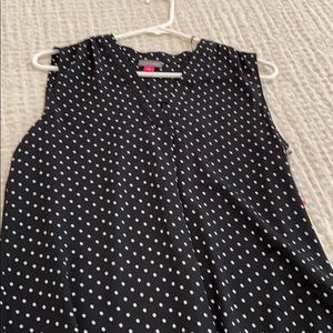 Black and white polka dot sleeveless blouse